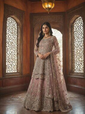 East Indian dusty rose festive dress for a wedding guest.